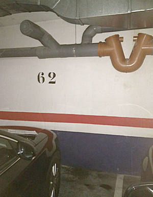 Reparación de tuberías en garaje Achique de aguas en garaje inundado